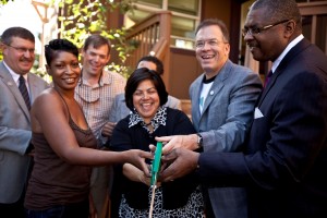 Tracie Cole with city officials and development partners at Pardee Commons ribbon cutting.