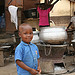 boywithstove A young Ghanian boy in front of a Torola stove.